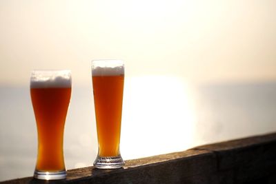 Close-up of beer glass on table