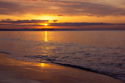 Scenic view of sea against sky during sunset