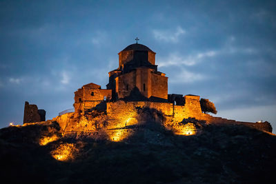 Low angle view of old building against sky