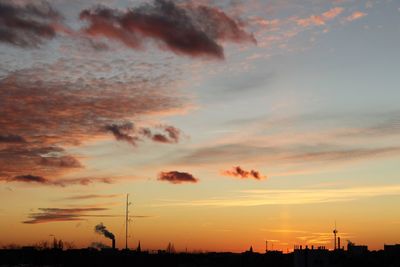 Scenic view of dramatic sky at sunset