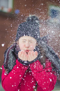 Close-up of girl in snow