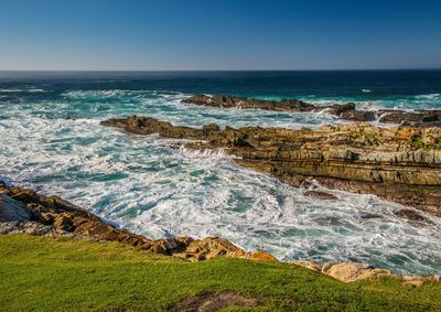 Scenic view of sea against clear sky