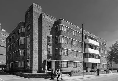 Low angle view of buildings against clear sky