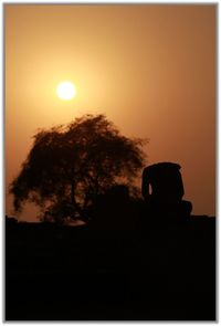 Silhouette of man at sunset