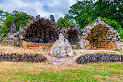 Old ruins of temple against cloudy sky