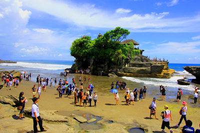 Tourists enjoying on beach