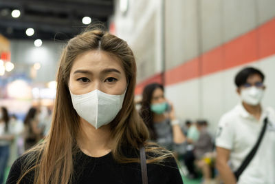 Portrait of woman wearing mask