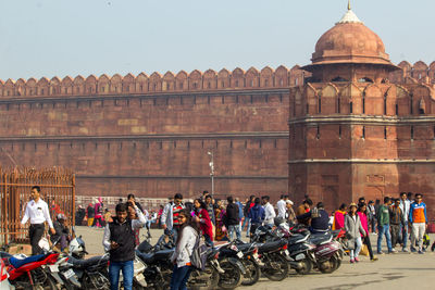 Group of people in front of historical building