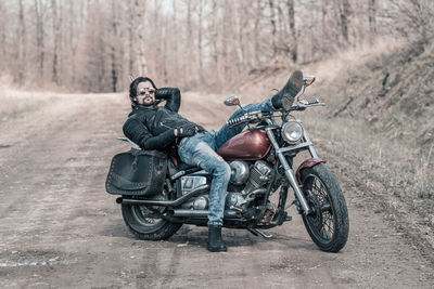Portrait of man riding motorcycle
