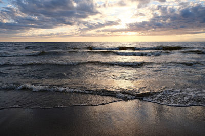 Scenic view of sea against sky during sunset