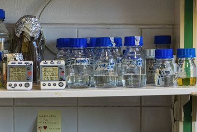 Close-up of bottles on shelf