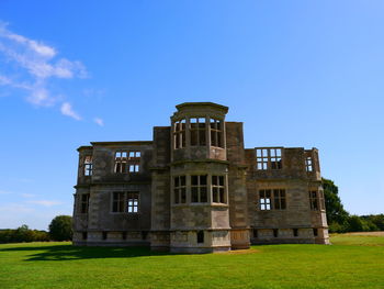 View of castle against blue sky