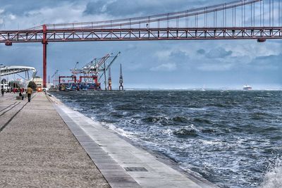 Pier over sea against sky