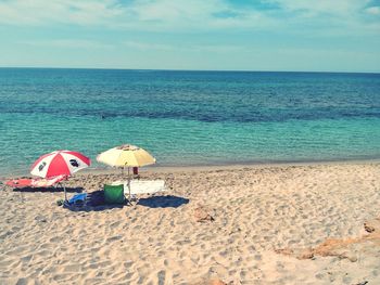 Scenic view of beach against sky