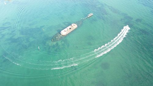 High angle view of sailboat in sea