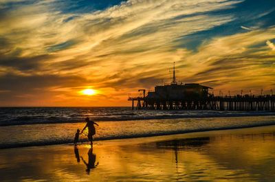 Scenic view of sea at sunset