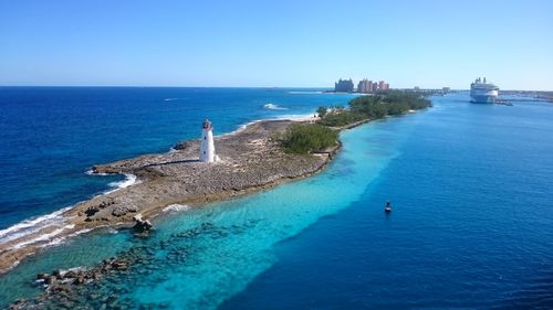 High angle view of sea against clear blue sky