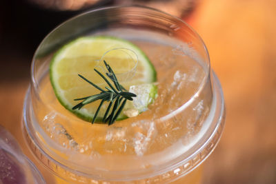 High angle view of drink in glass on table