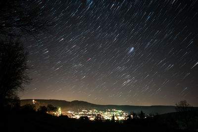 Scenic view of star field against sky at night