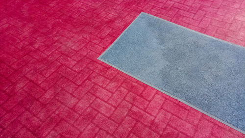 High angle view of carpet on patterned floor