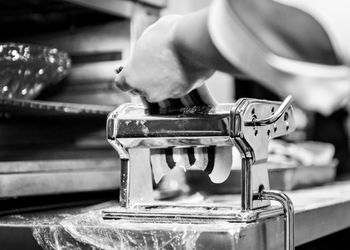 Chef cooking in a kitchen, chef at work, black and white