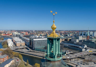 Stockholm city hall roof and golden crowns on the top. sweden. drone point of view