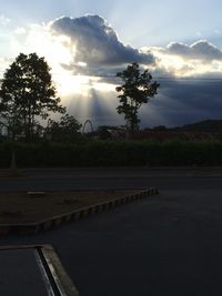 Scenic view of landscape against cloudy sky