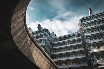 Low angle view of modern building against sky