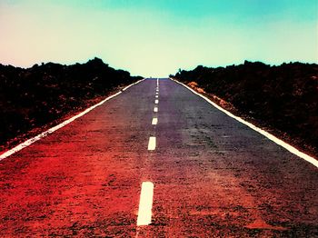 View of road against blue sky