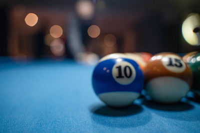 Close-up of pool balls on table