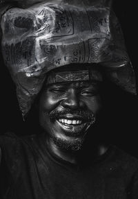 Close-up portrait of a smiling young man