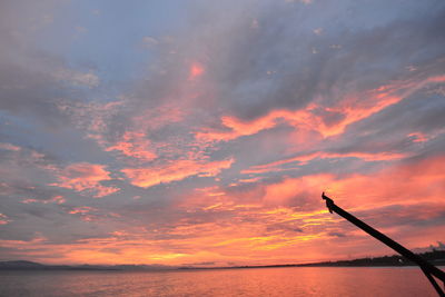 Scenic view of sea at sunset