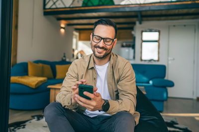 Young man using mobile phone