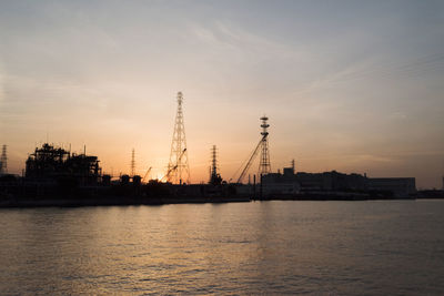 View of commercial dock against sky during sunset