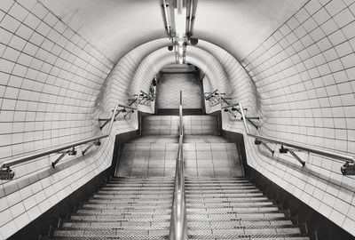 Steps in illuminated subway station