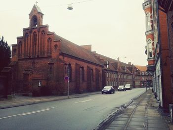 Cars on road in city