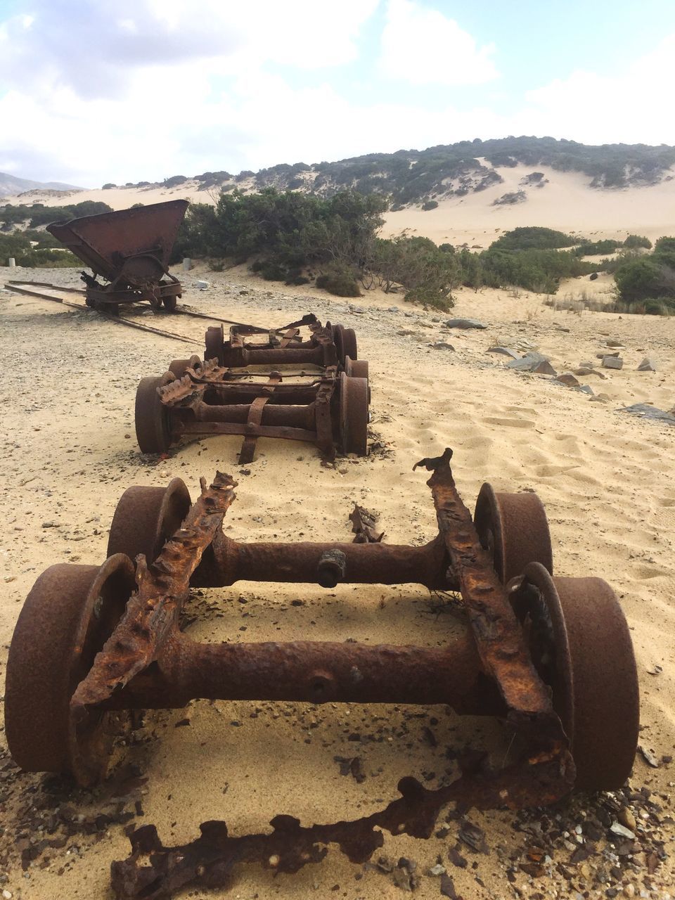 OLD ABANDONED TRUCK ON FIELD