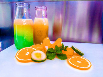 Fruits in glass on table