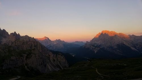 Scenic view of mountains against sky during sunset