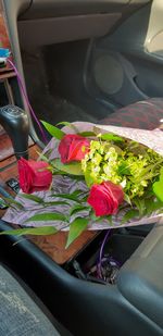 Red roses in car