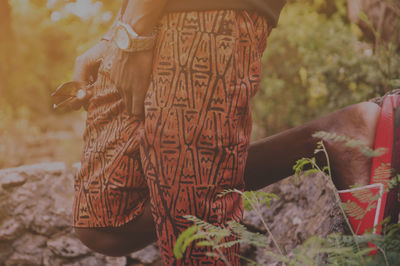 Close-up of woman holding wicker basket