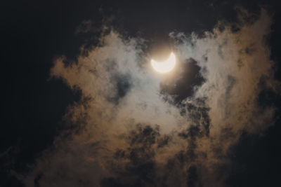 Low angle view of moon against sky at night