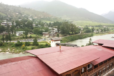 High angle view of swimming pool by mountain against sky