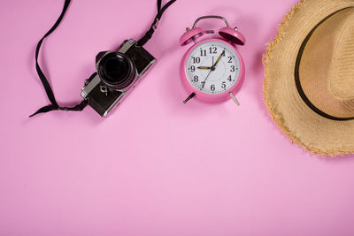 High angle view of clock on table
