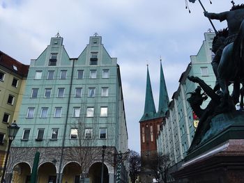 Low angle view of buildings against sky