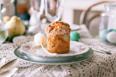 Happy easter holiday in springtime season. natural homemade baked cake on plate on table