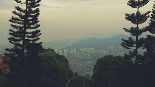 Scenic view of cityscape against sky