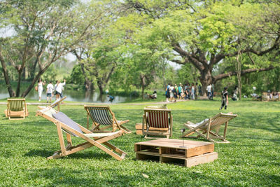 Empty chairs and tables in park