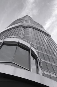 Low angle view of skyscraper against sky