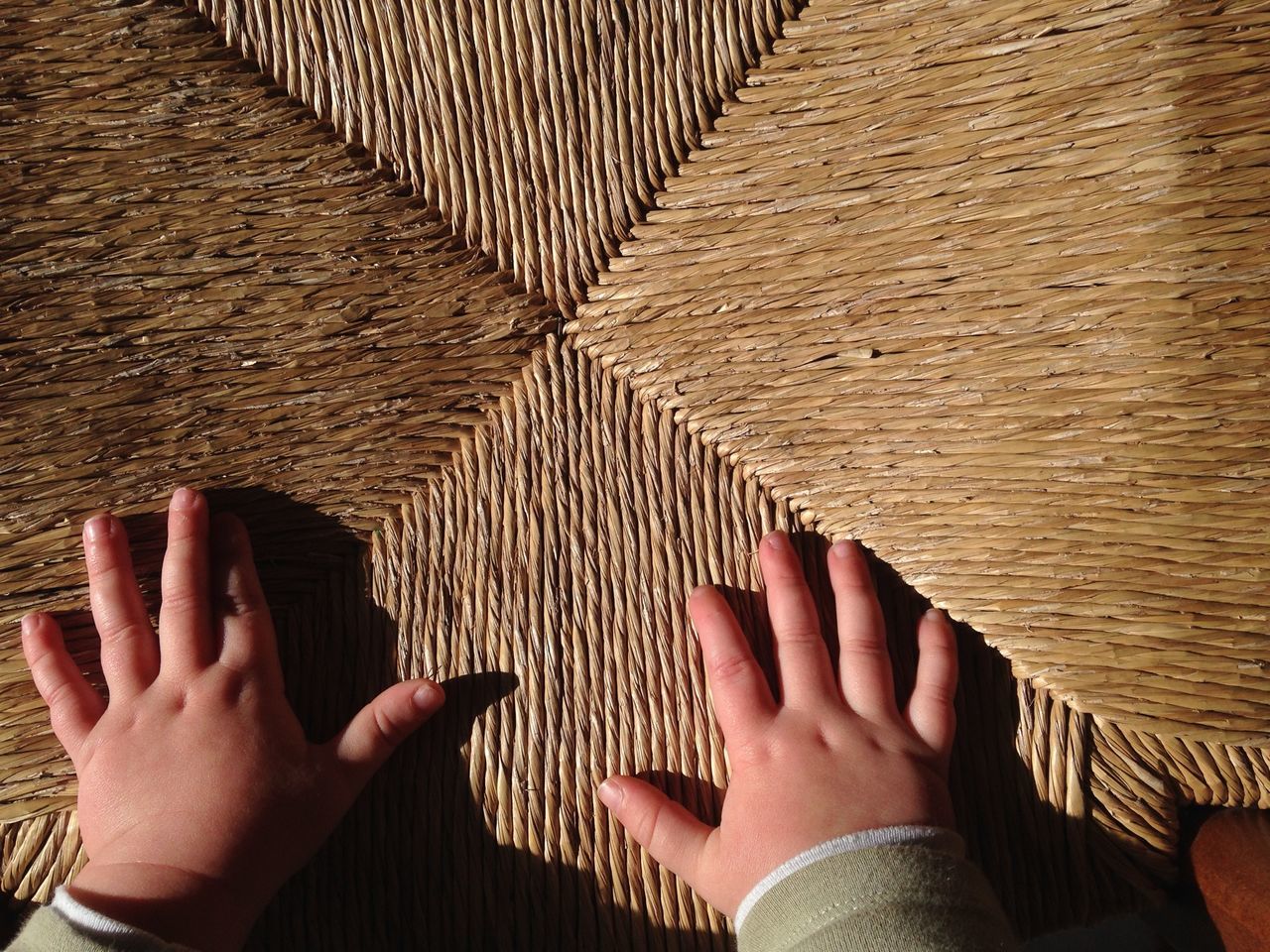 personal perspective, person, low section, lifestyles, indoors, part of, leisure activity, barefoot, sand, human foot, unrecognizable person, sunlight, cropped, pattern, high angle view